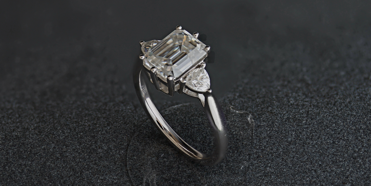 Three Stone Series: Emerald with Trillion Side Stone