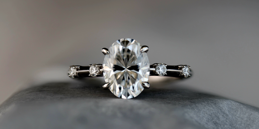 Solitaire Series: Oval Diamond with 4 Prong Setting Side Stones